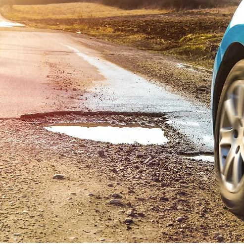 Potholes wreak havoc on your wheels suspension and steering